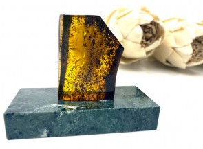 Amber piece on a granite stand
